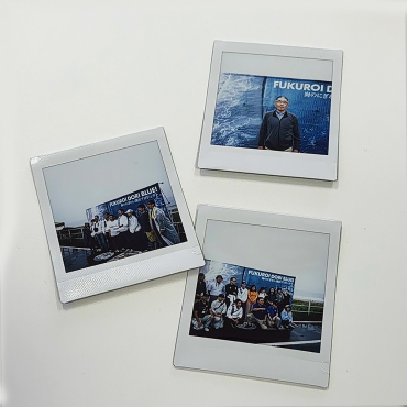 取材の様子をポラロイドカメラで撮影した写真の画像1